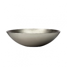 Organically molded under fire, this handmade bowl exudes metal artistry with a New York edge. Organically molded under fire, this handmade bowl exudes metal artistry with a New York edge.