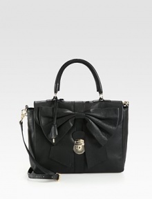 A feminine design with a structured frame in supple leather accented with a large bow.Double top handles, 5½ dropDetachable adjustable shoulder strap, 21½-23 dropSlide-lock flap closureOne inside zip pocketTwo inside open pocketsCotton lining11½W X 8½H X 3½DMade in Italy A feminine design with a structured frame in supple leather accented with a large bow.Double top handles, 5½ dropDetachable adjustable shoulder strap, 21½-23 dropSlide-lock flap closureOne inside zip pocketTwo inside open pocketsCotton lining11½W X 8½H X 3½DMade in Italy