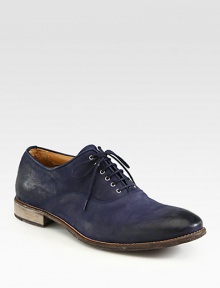 Derby style lace-up, crafted in burnished navy leather, lends the look and feel of a well-worn favorite.Leather upperLeather liningPadded insoleLeather soleMade in Italy