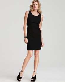This little black dress from DKNY exudes class and poise, day or night. Dress up with jewelry and peep-toe pumps or keep the look simple for elegant workdays. This little black dress from DKNY exudes class and poise, day or night. Dress up with jewelry and peep-toe pumps or keep the look simple for elegant workdays.