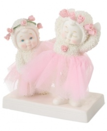 Getting prepared for the annual dance recital, these Snowbabies take a moment to practice. Crafted of porcelain bisque from Department 56.