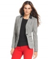 MICHEAL Michael Kors' houndstooth blazer looks extra sharp with elbow patches and buttoned cuffs. Makes an on-trend statement with bold-hued skinny pants.