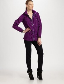 Inspired by utility gear, a sleek jacket in durable ripstop nylon with silvertone hardware and a roll-and-stow hood.Mockneck collar with hoodZip-front closureFront zip pocketsSlightly shirred seams for a ruched lookAdjustable waist with drawcordsAbout 28½ from shoulder to hemNylonMachine washImported Model shown is 5'10 (177cm) wearing US size Small. Inspired by utility gear, a sleek jacket in durable ripstop nylon with silvertone hardware and a roll-and-stow hood.Mockneck collar with hoodZip-front closureFront zip pocketsSlightly shirred seams for a ruched lookAdjustable waist with drawcordsAbout 28½ from shoulder to hemNylonMachine washImported Model shown is 5'10 (177cm) wearing US size Small.