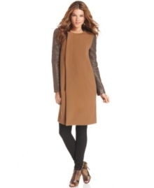 Presenting the most chic way to cover up: BCBGMAXAZRIA's coat combines unique coated-knit sleeves with clean lines and an asymmetrical closure. Presenting the most chic way to cover up: BCBGMAXAZRIA's coat combines unique coated-knit sleeves with clean lines and an asymmetrical closure.
