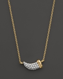 A diamond horn sparkles on this delicate 14K yellow gold necklace from Meira T.