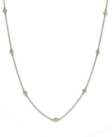 Inch by inch of luminous sparkle. B. Brilliant's delicate necklace features eleven round-cut cubic zirconia stations (1-1/10 ct. t.w.) set in 18k gold over sterling silver. Approximate length: 36 inches. Inch by inch of luminous sparkle. B. Brilliant's delicate necklace features eleven round-cut cubic zirconia stations (1-1/10 ct. t.w.) set in 18k gold over sterling silver. Approximate length: 36 inches.