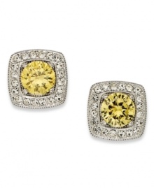 Canary yellow sings in this set of framed stud earrings from Eliot Danori. Crafted from silver-tone brass and cubic zirconia (2 ct. t.w.), and surrounded by sparkling accents, the earrings make a bold statement. Approximate drop: 1/2 inch.