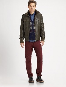 A butter-soft Italian leather jacket with military-inspired epaulettes, ribbed-knit trim and a plethora of zipper pockets.Stand collarFront zipperEpaulettesZippered pocketsRibbed-knit detailsBack yokeAbout 27 from shoulder to hemLeatherDry clean by leather specialistImported of Italian fabric A butter-soft Italian leather jacket with military-inspired epaulettes, ribbed-knit trim and a plethora of zipper pockets.Stand collarFront zipperEpaulettesZippered pocketsRibbed-knit detailsBack yokeAbout 27 from shoulder to hemLeatherDry clean by leather specialistImported of Italian fabric