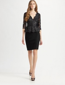 The quintessential combination of lovely lace and alluring tailoring, a gorgeous blouse with on-trend peplum. Deep v-neckThree-quarter sleevesScalloped trimConcealed back zipperFully linedAbout 21 from shoulder to hemNylon/viscose/rayonHand washImportedSIZE & FIT Model shown is 5'11 (180cm) wearing a US size 4. 