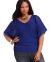 Get your shine on this season with Baby Phat's dolman sleeve plus size sweater, spotlighting a sequined finish.