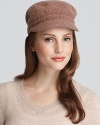 A cozy conductor hat in a modboy style with small brim.