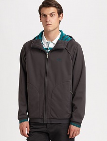 This sporty double-faced design features colorful rib-knit cuffs and a signature embroidered logo.Attached hoodZip frontSignature embroiderySide zip pocketsRib-knit cuffsAbout 28 from shoulder to hem84% polyester/16% polyurethaneMachine washImported