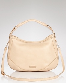 In neutral, pebbled leather, this Burberry hobo offers a versatile canvas that compliments every outfit. In neutral, pebbled leather, this Burberry hobo offers a versatile canvas that compliments every outfit.