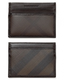 Add a touch of classic Burberry style with this handsome ID card holder patterned with the iconic signature check. Add a touch of classic Burberry style with this handsome ID card holder patterned with the iconic signature check.