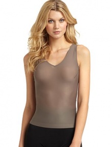THE LOOKFeatures slimming Happy Technology for pain-free shapingV-neckDarts at bustTHE FITAbout 20 from shoulder to hemTHE MATERIAL70% nylon/30% elastaneCARE & ORIGINMachine washImportedModel shown is 5'10½ (179cm) wearing US size Small. FIT RECOMMENDATION: Order one size down as this style runs large. THE LOOKFeatures slimming Happy Technology for pain-free shapingV-neckDarts at bustTHE FITAbout 20 from shoulder to hemTHE MATERIAL70% nylon/30% elastaneCARE & ORIGINMachine washImportedModel shown is 5'10½ (179cm) wearing US size Small. FIT RECOMMENDATION: Order one size down as this style runs large.
