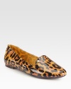 Bold leopard print design with a polished finish. Rubber upperRubber lining and solePadded insoleImportedOUR FIT MODEL RECOMMENDS ordering ½ size up as this style runs small. 