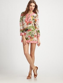 A vibrant coverup offering the best of both worlds: pretty prints and a relaxed-yet-flattering fit.Round neckThree-quarter sleevesButton placketContrast trimPull-on style72% cotton/28% silkDry cleanMade in USA of Italian fabric A vibrant coverup offering the best of both worlds: pretty prints and a relaxed-yet-flattering fit.Round neckThree-quarter sleevesButton placketContrast trimPull-on style72% cotton/28% silkDry cleanMade in USA of Italian fabric