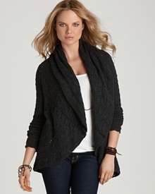 A pointelle weave lends texture with a hint of whimsy to this plush C by Bloomingdale's cashmere cardigan.