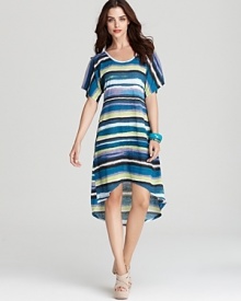 Printed in painterly stripes, this super-soft C&C California dress flaunts a high/low hem for playful movement. Printed in painterly stripes, this super-soft C&C California dress flaunts a high/low hem for playful movement.