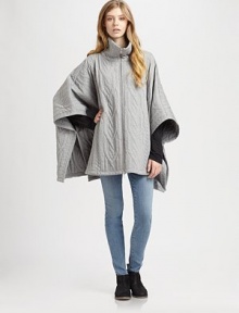 Supremely soft, cable-knit cape of pure cotton, updated by a funnelneck, front zipper and convenient slash pockets. FunnelneckFront zipperCape sleevesSlash pocketsAbout 29 from shoulder to hemCottonMachine washMade in Italy of imported fabricModel shown is 5'10 (177cm) wearing US size Small. Supremely soft, cable-knit cape of pure cotton, updated by a funnelneck, front zipper and convenient slash pockets. FunnelneckFront zipperCape sleevesSlash pocketsAbout 29 from shoulder to hemCottonMachine washMade in Italy of imported fabricModel shown is 5'10 (177cm) wearing US size Small.