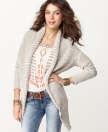 Add some hippie-chic style to your look with a super comfy cardigan from Free People. Pair it over a peasant top and relaxed jeans for a laid-back outfit.