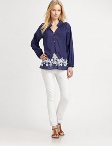 A stunning embroidered hem adds must-have charm to this simply chic cotton top with a relaxed fit.Split neckLong sleevesButton placketContrast embroidery at hemSmocked and pleat details at backAbout 25 from shoulder to hemCottonMachine washImported Model shown is 5'10 (177cm) wearing US size Small. 