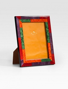 A true original, crafted in Italy from inlaid wood with a rich kaleidoscope of colors. Overall, 7 X 9 Accommodates a 5 X 7 photograph Leather/wood Made in Italy A true original, crafted in Italy from inlaid wood with a rich kaleidoscope of colors. Overall, 7 X 9 Accommodates a 5 X 7 photograph Leather/wood Made in Italy