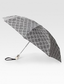 Banish rainy day blues with this sleek, stylish, lace print design.Automatic open and manual closeOpen diameter, about 37Folded length, about 10PolyesterImported Banish rainy day blues with this sleek, stylish, lace print design.Automatic open and manual closeOpen diameter, about 37Folded length, about 10PolyesterImported
