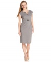 Kasper updates a petite sheath silhouette with a chic split-neck design and seamed waist with a buckled detail.