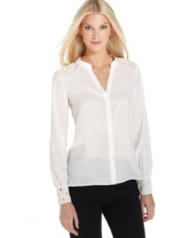 Grace Elements adds an intriguing touch to this button-front blouse by styling the shoulders and cuffs with a chic cutout design.