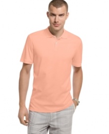 The classic polo that refines any casual look in a luxurious feeling cotton weave from Calvin Klein. The classic polo that refines any casual look in a luxurious feeling cotton weave from Calvin Klein.
