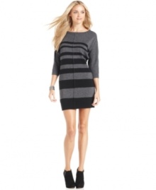 Solid stripes on metallic knit makes a big impact on this sleek sweater dress from DKNY Jeans.