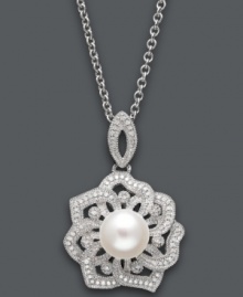 Natural inspiration. This stunning open-cut flower pendant features a single cultured freshwater pearl (8-9 mm) surrounded by round-cut diamond encrusted petals (1/5 ct. t.w.). Setting and chain crafted in sterling silver. Approximate length: 18 inches. Approximate drop: 1-1/4 inches. Natural inspiration. This stunning open-cut flower pendant features a single cultured freshwater pearl (8-9 mm) surrounded by round-cut diamond encrusted petals (1/5 ct. t.w.). Setting and chain crafted in sterling silver. Approximate length: 18 inches. Approximate drop: 1-1/4 inches.
