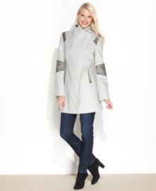 Modern styling elevates this coat from Calvin Klein. Its sleek colorblocking and faux-leather trim add dimension and flair to your winter wardrobe! Modern styling elevates this coat from Calvin Klein. Its sleek colorblocking and faux-leather trim add dimension and flair to your winter wardrobe!