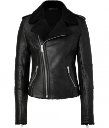 Warm and fashionable leather jacket is a must-have for the season - Designed in waxed lambskin in classic moto style - Features deep lapel with asymmetric zip, zipped side pockets, and shearling lining - Raw waisted, feminine cut with long, slim zipped sleeves and decorative stitching at the elbow - Wear with skinny pants and stilettos for a night out, or with a knit dress and booties