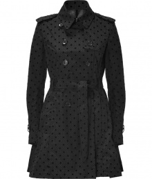 Stay stylish and sweet in Valentino R.E.Ds black nylon trench, detailed with velvet dots and a fun flounce for playfully chic results we love! - Classic trench styling, double-breasted button-down front, self-tie sash around the waist - Fitted and flared silhouette - Wear over cocktail frocks with heels and a leather clutch