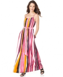 Calvin Klein's striped maxi is on the spring must-have list with its colorful print and chic style.