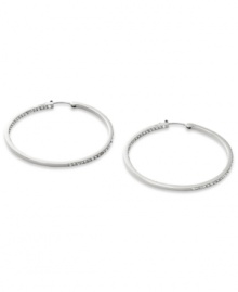 Go full-blitz with these glitzy hoop earrings from Fossil. The classic design is amped up with clear pave crystal accents. Crafted in polished stainless steel. Approximate diameter: 2 inches.