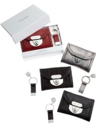 A fabulous gift for a friend or colleague, this Calvin Klein wallet - available only at Macy's! - is crafted from fine leather and features a trendy turnlock on the front and convenient ID window on the back. Comes with a bejeweled keychain in a gift box. A fabulous gift for a friend or colleague, this Calvin Klein wallet - available only at Macy's! - is crafted from fine leather and features a trendy turnlock on the front and convenient ID window on the back. Comes with a bejeweled keychain in a gift box.