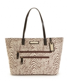 A Macy's exclusive! This Calvin Klein tote features 2 front zip pockets and a roomy interior, and it's available in a range of colors prints. A great bag for every day.