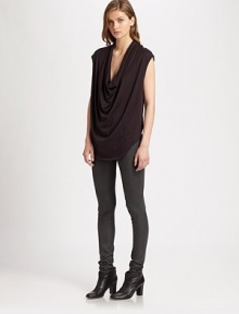 From the HELMUT capsule collection. Softly draped jersey with cap sleeves and a modern shirttail hem hitting below the hips. CowlneckCap sleevesShirttail hem hits below the hipsAbout 30 from shoulder to hem50% modal/50% pima cottonDry cleanImportedModel shown is 5'10 (177cm) wearing US size Small.