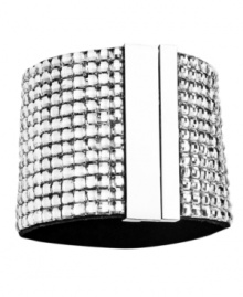 Definitely dazzling! Glittering glass accents adorn this chic cuff bracelet from Catherine Stein. Set in silver tone mixed metal, it's a glamorous addition to your night on the town wardrobe. Equipped with a magnetic closure. Approximate diameter: TK inches. Definitely dazzling! Glittering glass accents adorn this chic cuff bracelet from Catherine Stein. Set in silver tone mixed metal, it's a glamorous addition to your night on the town wardrobe. Equipped with a magnetic closure. Approximate diameter: TK inches.