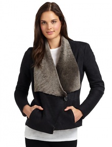 THE LOOKFlap collarAsymmetric button closureKnit insets along sleevesDual seam pocketsTHE FITAbout 26 from shoulder to hemTHE MATERIALDyed shearlingGenuine sheepskinCARE & ORIGINDry clean by fur specialistFur origin: SpainImportedModel shown is 5'9½ (176cm) wearing US size Small. THE LOOKFlap collarAsymmetric button closureKnit insets along sleevesDual seam pocketsTHE FITAbout 26 from shoulder to hemTHE MATERIALDyed shearlingGenuine sheepskinCARE & ORIGINDry clean by fur specialistFur origin: SpainImportedModel shown is 5'9½ (176cm) wearing US size Small.