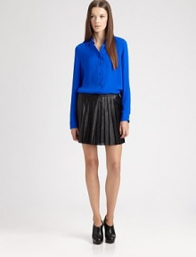 Lightly perforated leather styled with sharp pleats from hip to hem in a flirty, flared silhouette.Wide waistbandAllover pleatsCenter back zipperAbout 17 longLambskinDry clean by a leather specialistImportedModel shown is 5'9½ (176cm) wearing US size 4. Lightly perforated leather styled with sharp pleats from hip to hem in a flirty, flared silhouette.Wide waistbandAllover pleatsCenter back zipperAbout 17 longLambskinDry clean by a leather specialistImportedModel shown is 5'9½ (176cm) wearing US size 4.