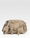 Luscious, supple calfskin, softly tailored with a double buckled front flap.Adjustable shoulder strap, 15½-20 drop Snap top closure Three outside zip pockets One outside open pocket One inside zip pocket Cotton lined 5W X 11H X 10D Imported