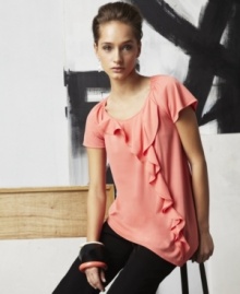 An asymmetrical hem adds unexpected edge to this softly ruffled doo.ri for Impulse blouse -- perfect over cigarette skinnies!