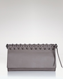Toughen up your after-hours line up with Oryany's braided leather clutch. In a crave-worthy shape and pared-down palette, this bag loves your darkest dresses and boots. Toughen up your after-hours line up with Oryany's braided leather clutch. In a crave-worthy shape and pared-down palette, this bag loves your darkest dresses and boots.