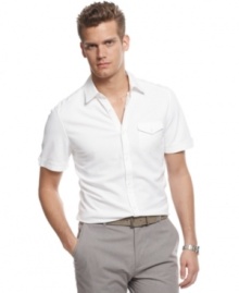 Stripped down for better performance.  Up your casual look with this short-sleeved woven shirt from Calvin Klein.