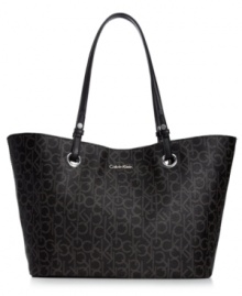 Add some signature style to your purse portfolio with this beautifully embossed bag from Calvin Klein. Stamped with the label's iconic monogram, this perennially chic piece is a must for any logo-loving fashionista. Add some signature style to your purse portfolio with this beautifully embossed bag from Calvin Klein. Stamped with the label's iconic monogram, this perennially chic piece is a must for any logo-loving fashionista.