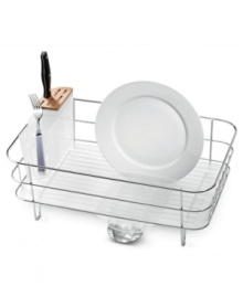 Reclaim your kitchen and keep your dishes spotless. This slim simplehuman dish rack features a slim design that opens up more valuable work space by incorporating a built-in drip tray and spout that empties directly into the sink -- no more ugly, bulky mats to cover up your precious counter space! Five-year warranty. Reclaim your kitchen and keep your dishes spotless. This slim simplehuman dish rack features a slim design that opens up more valuable work space by incorporating a built-in drip tray and spout that empties directly into the sink -- no more ugly, bulky mats to cover up your precious counter space! Five-year warranty.